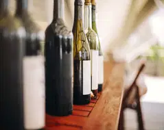 wine-bottles-on-wooden-table-2025-01-09-22-02-15-utc (2)